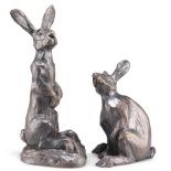 JULIA HULME, A PAIR OF BRONZED MODELS OF HARES