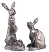 JULIA HULME, A PAIR OF BRONZED MODELS OF HARES
