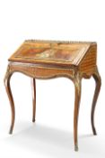 A 19TH CENTURY FRENCH ROSEWOOD AND PAINTED GILT-METAL MOUNTED BUREAU DE DAME