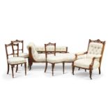 A VICTORIAN WALNUT SIX-PIECE PARLOUR SUITE