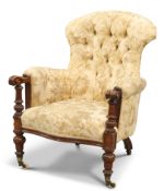 A VICTORIAN MAHOGANY AND UPHOLSTERED BUTTON-BACK ARMCHAIR