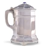 AN ART DECO SILVER LIDDED TANKARD