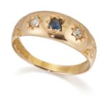 AN 18 CARAT GOLD SAPPHIRE AND DIAMOND THREE STONE RING