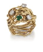 INGEBORG RUTH BRATMAN - AN 18 CARAT GOLD EMERALD AND DIAMOND RING