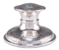 AN ARTS AND CRAFTS SILVER CAPSTAN INKWELL
