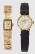 A LADY'S 18 CARAT GOLD OMEGA WATCH AND A 9 CARAT GOLD EVERITE WATCH