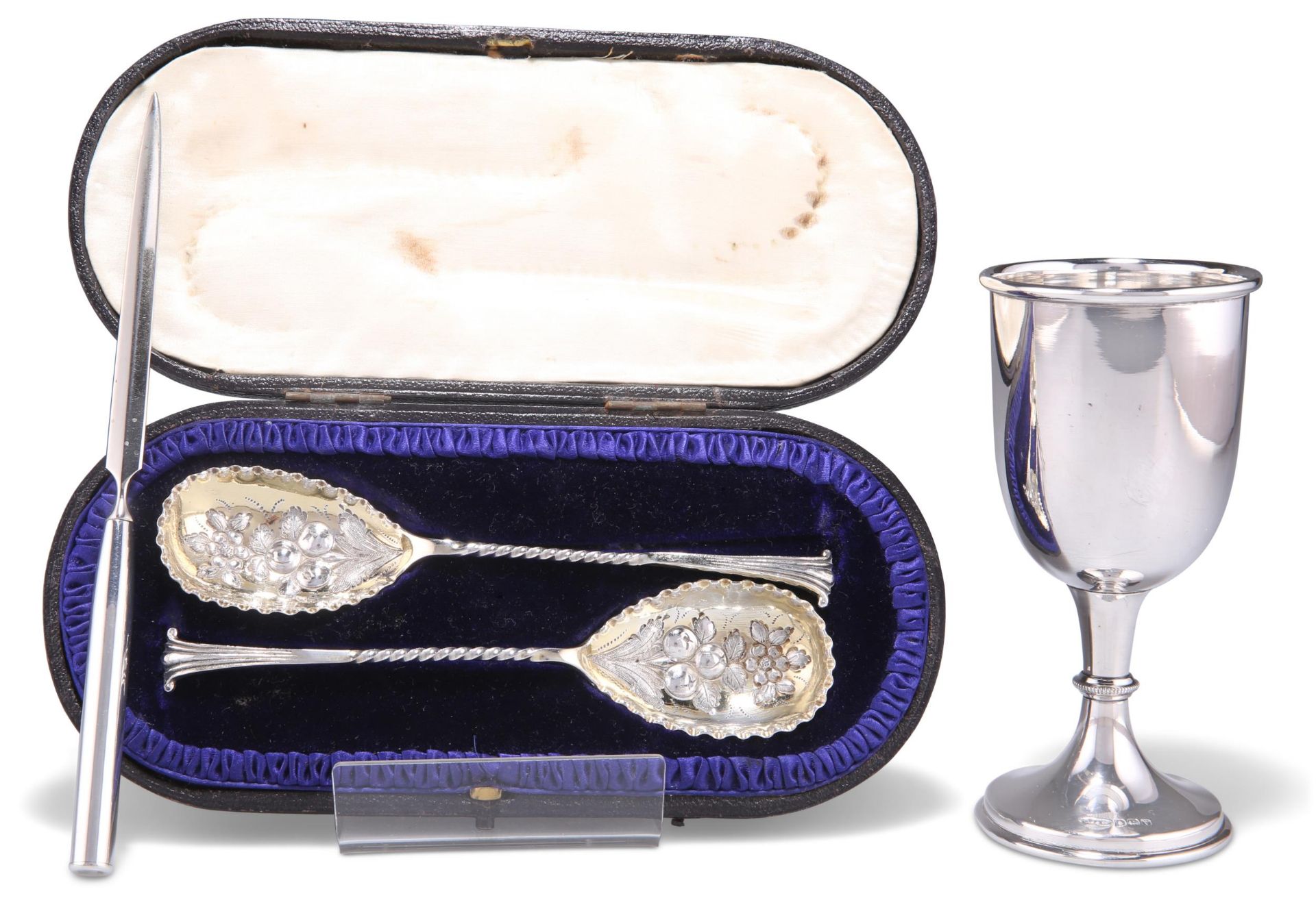 A PAIR OF SILVER-GILT BERRY SPOONS, A SILVER GOBLET AND LETTER KNIFE