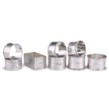EIGHT ASSORTED SILVER NAPKIN RINGS