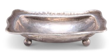 AN ARTS AND CRAFTS SMALL SILVER DISH