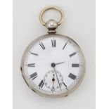 A WHITE METAL OPEN FACE POCKET WATCH