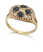 AN 18 CARAT GOLD SAPPHIRE AND DIAMOND CLUSTER RING