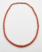 A CORAL BEAD NECKLACE