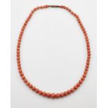 A CORAL BEAD NECKLACE