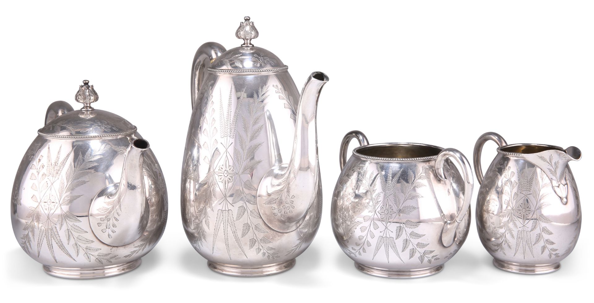 A VICTORIAN AESTHETIC MOVEMENT SILVER-PLATED TEA AND COFFEE SERVICE