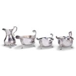 THREE SILVER SAUCE BOATS AND A SILVER CREAM JUG