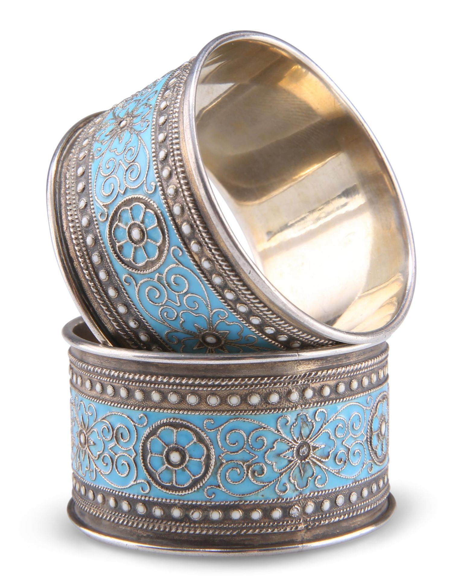 A PAIR OF NORWEGIAN SILVER AND ENAMEL NAPKIN RINGS
