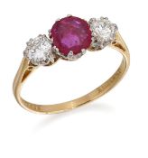 A RUBY AND DIAMOND THREE STONE RING