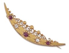 A VICTORIAN RUBY AND DIAMOND CRESCENT BROOCH