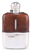 A GEORGE V SILVER AND CROCODILE LEATHER HIP FLASK