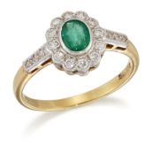 AN 18 CARAT GOLD EMERALD AND DIAMOND CLUSTER RING