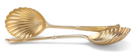 A PAIR OF VICTORIAN SILVER-GILT SERVING SPOONS