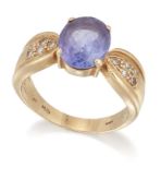 A TANZANITE AND DIAMOND RING