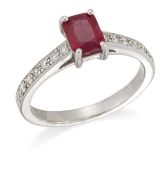 AN 18 CARAT WHITE GOLD RUBY AND DIAMOND RING