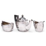 A GEORGE V SILVER THREE-PIECE TEA SERVICE