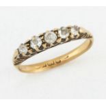 AN 18 CARAT GOLD DIAMOND RING