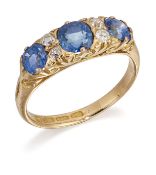 A VICTORIAN 18 CARAT GOLD SAPPHIRE AND DIAMOND RING