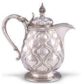 AN ARTS AND CRAFTS SILVER WATER JUG