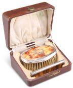 A GEORGE V SILVER-MOUNTED FAUX BLONDE TORTOISESHELL BRUSH AND COMB SET