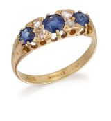 AN 18 CARAT GOLD SAPPHIRE AND DIAMOND RING