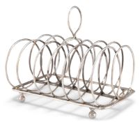 A GEORGE III SILVER TOAST RACK