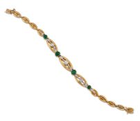 AN EMERALD AND DIAMOND BRACELET