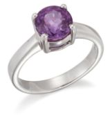 AN 18 CARAT WHITE GOLD PINK SAPPHIRE RING