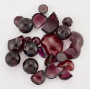 A QUANTITY OF GARNET BEADS AND CABOCHONS