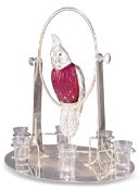 A SILVER-PLATED AND CRANBERRY GLASS NOVELTY DRINKS SET