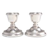 A PAIR OF ELIZABETH II SILVER DWARF CANDLESTICKS