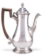 A GEORGE III SILVER COFFEE POT