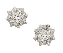 A PAIR OF 18 CARAT WHITE GOLD SOLITAIRE DIAMOND EARRINGS