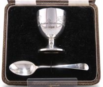 A GEORGE VI CHRISTENING SILVER EGG CUP AND SPOON