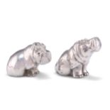 A PAIR OF STERLING SILVER NOVELTY SALT AND PEPPER POTS