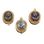 A CASED SET OF THREE STUDS