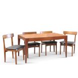A 1970S DANISH TEAK DINING TABLE AND FOUR CHAIRS