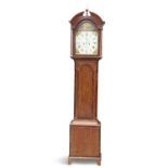 AN EARLY 19TH CENTURY OAK AND MAHOGANY EIGHT-DAY LONGCASE CLOCK