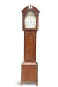 AN EARLY 19TH CENTURY OAK AND MAHOGANY EIGHT-DAY LONGCASE CLOCK