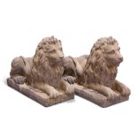 A PAIR OF RECONSTITUTED STONE LIONS