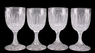 A SET OF FOUR VICTORIAN CUT GLASS WINE GLASSES