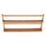AN ERCOL LIGHT ELM HANGING PLATE RACK AND CD CABINET